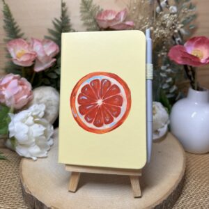 A6 Lined Notebook Orange Slice on Lemon